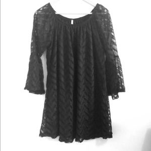 Woman’s black lace dress